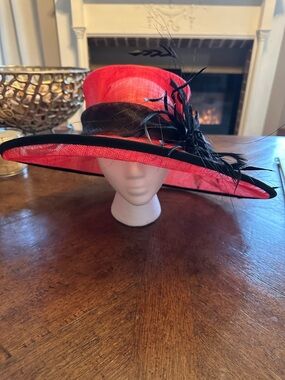 Classic Red Wide-Brim Dress Hat with Black Trim and Feather Detail